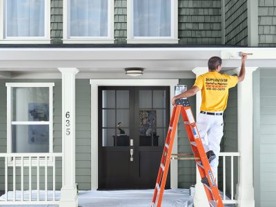 Painter on apartment complex